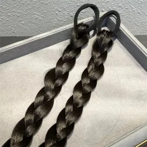 Black braided hair extension detail view, synthetic hair ponytail piece for traditional Chinese style.