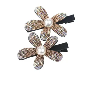 Sparkling rhinestone pearl flower hair clip detail, elegant crystal hairpin accessory.
