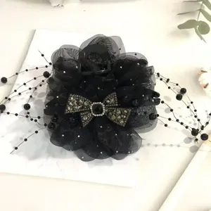 Oversized black mesh peony hair claw clip with rhinestones and pearl tassels for women.