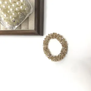 Elegant crystal beaded hair tie, sparkling elastic scrunchie and fashion bracelet for women.