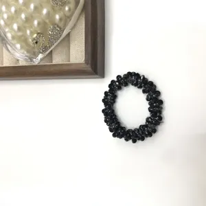 Black crystal beaded hair tie elastic hair rope rubber band bracelet for women daily styling.
