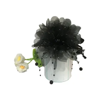 Black mesh peony flower hair claw clip with beaded tassels stylish hair styling accessory.