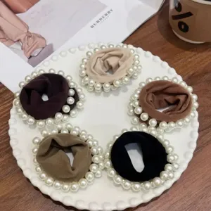 Pearl embellished hair scrunchies detail view, high elasticity and comfortable daily hair ties.