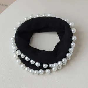 Black pearl hair scrunchie for women, elegant elastic hair tie rope for styling.