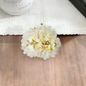 Chiffon flower hair grab clip with pearl bead tassels, elegant hair claw for women styling.