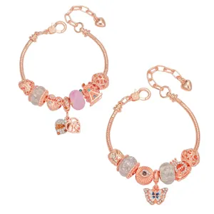 Rose gold charm bracelet set with cute heart and butterfly pendants for women jewelry.