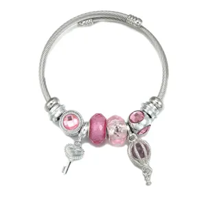 Pulsera DIY de acero inoxidable para mujer con cuentas rosa, llave y dijes de globo aerostático.