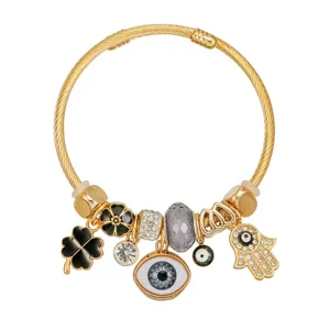 Bracciale con ciondoli placcato oro con occhio malvagio mano di Fatima e cristalli donna