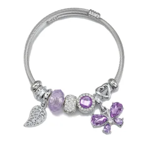 Stainless steel cable wire charm bracelet with purple crystal butterfly and leaf pendants.