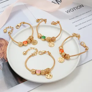 Gold-plated snake chain charm bracelets featuring colorful zodiac sign pendants and beads for women.