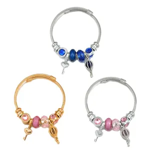 Pulsera de dijes DIY de acero inoxidable con llave de corazón y globo aerostático.