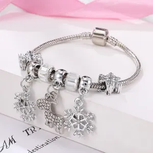 Christmas charm bracelet featuring sparkling snowflakes and reindeer pendants for holiday gifts.