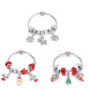 Christmas charm bracelet set featuring snowflake, reindeer and Santa Claus charms.
