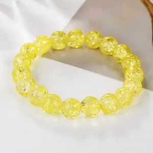 Yellow crackle crystal bracelet for women, sparkling stone beaded jewelry accessory detail view.