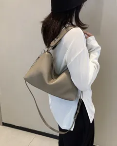 Genuine leather shoulder crossbody bag for women, stylish minimalist hobo handbag in taupe.
