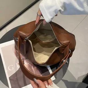 Stylish genuine leather shoulder bag for women, trendy brown top-layer cowhide tote.