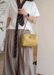 Genuine leather shoulder bag underarm baguette bag for women with metal lock closure stylish everyday