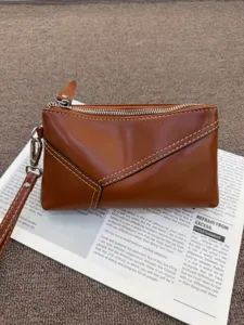 Vintage genuine leather women clutch bag large capacity retro brown purse with wrist strap.