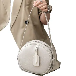 Retro round genuine leather crossbody bag, soft pebble cowhide shoulder bag for women.