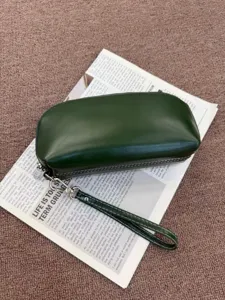 Dark green leather clutch bag portable cosmetic pouch with wrist strap and white stitching