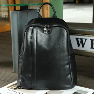 Black leather backpack for women, casual soft leather large daypack with metal zippers.