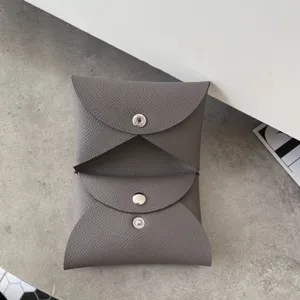 Genuine leather card case minimalist envelope coin purse portable double snap wallet daily use.