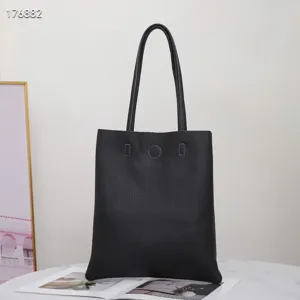 Classic black leather tote bag for women, large capacity minimalist shoulder bag daily use.
