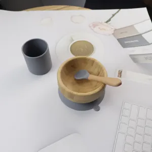 Bamboo kids suction bowl and spoon set with silicone base, eco-friendly wooden tableware.