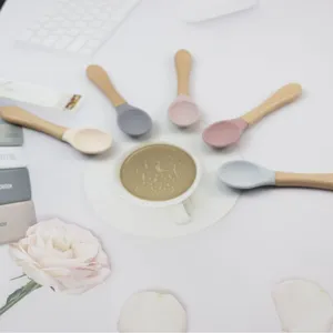 Silicone baby spoons with wooden handles set, safe toddler feeding spoons for daily use.