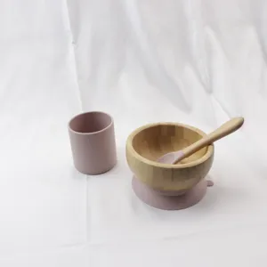 Wooden baby bowl set with silicone suction cup, pink cup and spoon for toddlers.