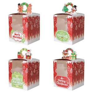 Kerst papier cadeau doos met helder doorzichtig venster voor muffins koekjes en taart.