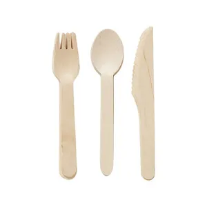 Close-up details of disposable wooden cutlery set featuring fork, spoon, and knife.