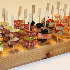 Disposable bamboo paddle skewers for BBQ, oden and party appetizers, eco-friendly.
