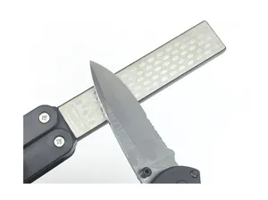 Double sided folding diamond pocket knife sharpener for outdoor camping and kitchen blade maintenance.
