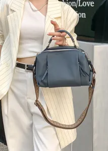 Genuine leather top-handle crossbody bag for women, casual stylish everyday shoulder purse.