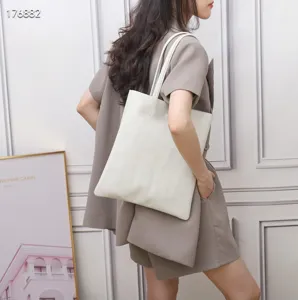 Minimalist white leather tote bag for women, elegant shoulder bag for daily casual commute style.
