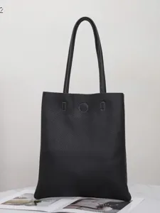 Black leather tote bag for women, large capacity minimalist shoulder bag for daily commuting.
