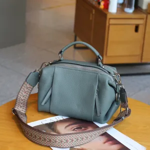 Genuine leather handbag for women, casual crossbody shoulder bag with wide strap and zip.
