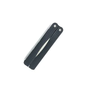 Close-up detail of the portable folding diamond pocket knife sharpener with textured handle.