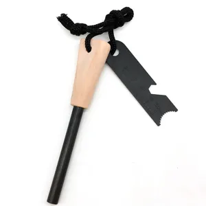 Outdoor survival fire starter tool detail, wooden handle magnesium rod and multi-tool scraper with scale.