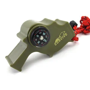 Sifflet de survie vert militaire avec boussole intégrée et cordon rouge pour la randonnée.