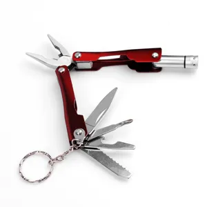 Multifunctional pocket tool with folding pliers, knife, screwdriver, and portable keychain design.