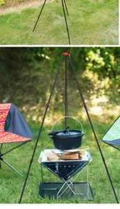 Detailansicht des Outdoor Camping Dreibeins aus schwarzem Metall auf dem grünen Rasen.