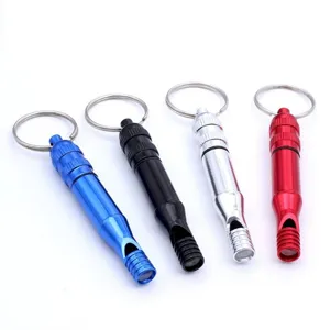 Aluminum alloy survival whistle detail showing waterproof compartment and keychain.