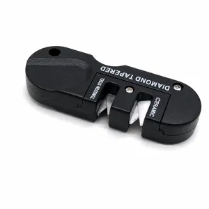 Pocket EDC knife sharpener detail showing tungsten steel and ceramic sharpening slots.