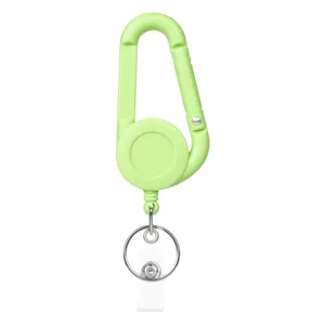 Mousqueton enrouleur rétractable vert avec porte-clés pour cartes d'identité et pendentif de sac.