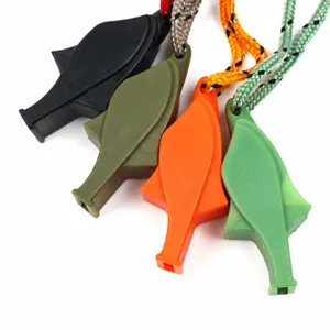 Detailed view of multi-color plastic survival whistles with lanyards for outdoor sports.