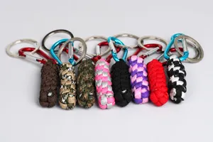 Detail view of handmade paracord keychains with metal carabiner, outdoor survival gear multi-color.