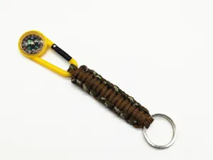 Paracord keychain with integrated compass and carabiner for outdoor survival and daily use.