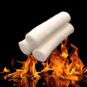 Outdoor portable survival fire starter magnesium rod and cotton roll set for camping emergency.